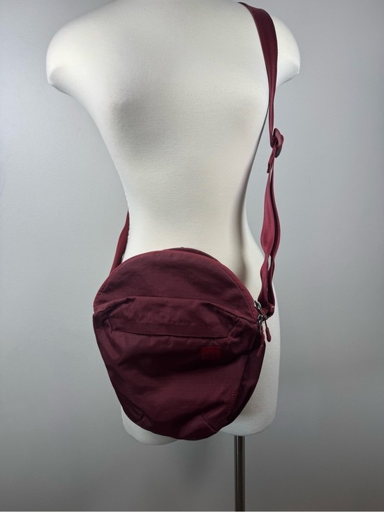 MEC Other - Circular Burgundy Crossbody Bag with Front Zip Pocket